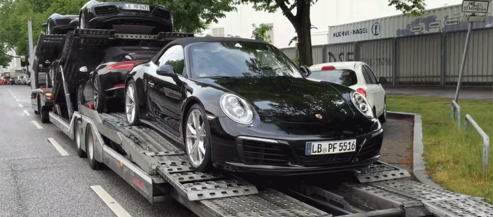 Transportieren Porsches 911 4 and 4S von Hamburg nach Kiel, Deuschland